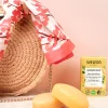 Douche végétale solide Ginger et Petit Grain Weleda - pain de 75g